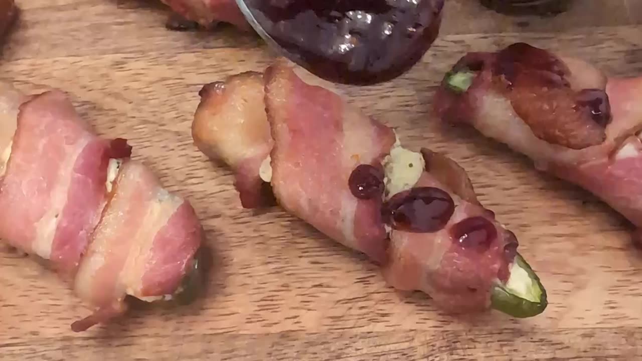 Smoked Jalapeño Cream Cheese Poppers | Bacon-Wrapped with Raspberry Drizzle #easyrecipes
