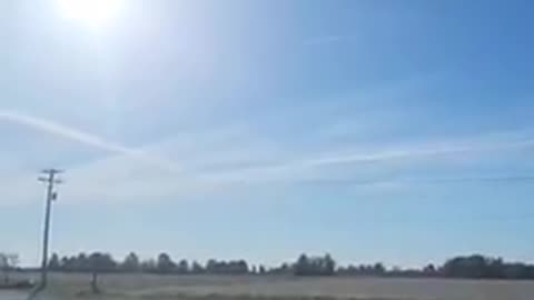 Doug and Stacy - Chemtrails - two planes flying parallel