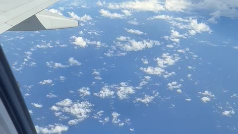 Atoll Seen From an Airplane Window