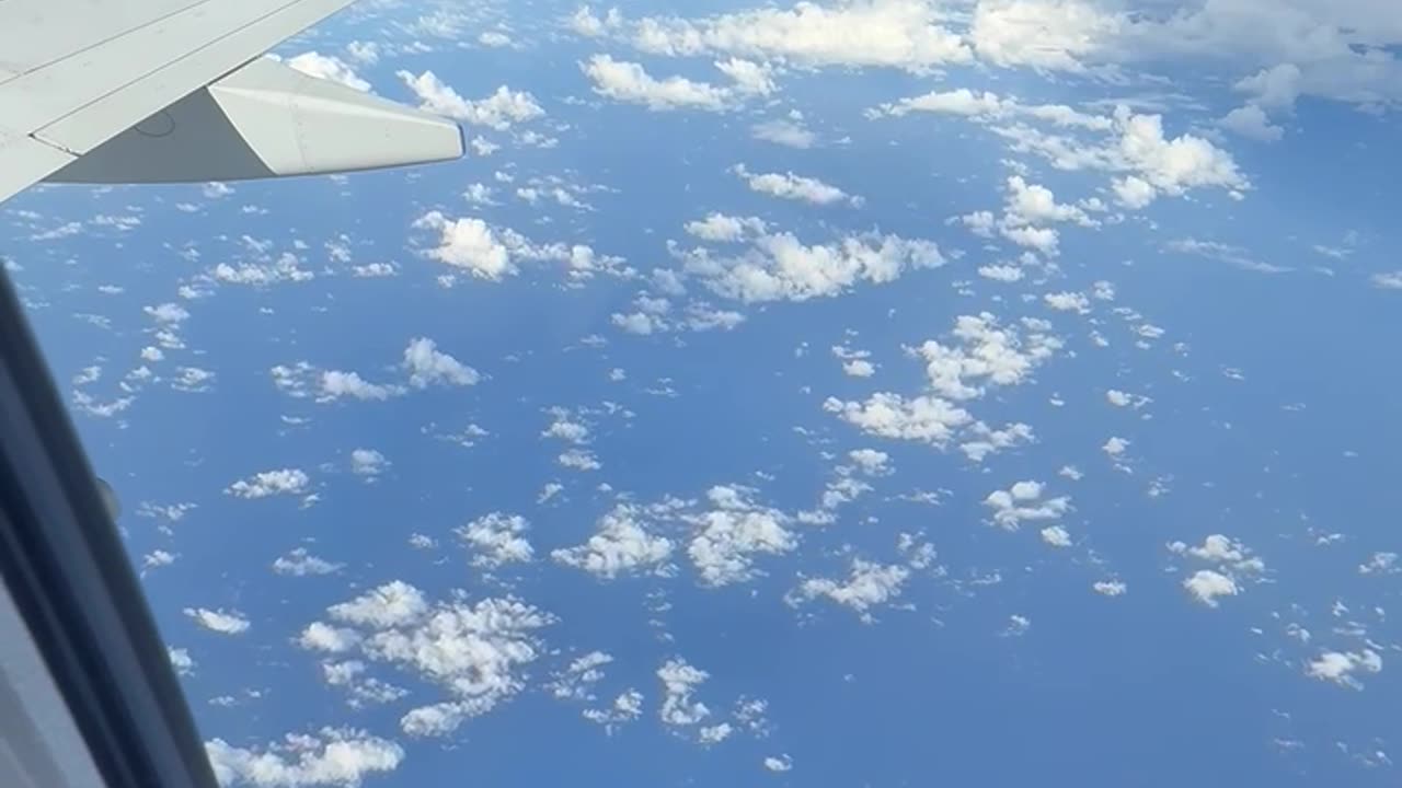 Atoll Seen From an Airplane Window