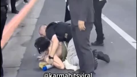 Dumb Protestor Taken Down By Police.. LMAO