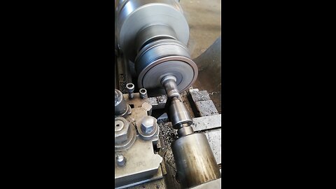 MACHININING EXCESSIVE MIG WELD IN REPAIRING BROKEN PULLEY PIN