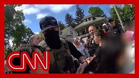 Bodycam video shows residents trying to stop ICE agents from arresting woman