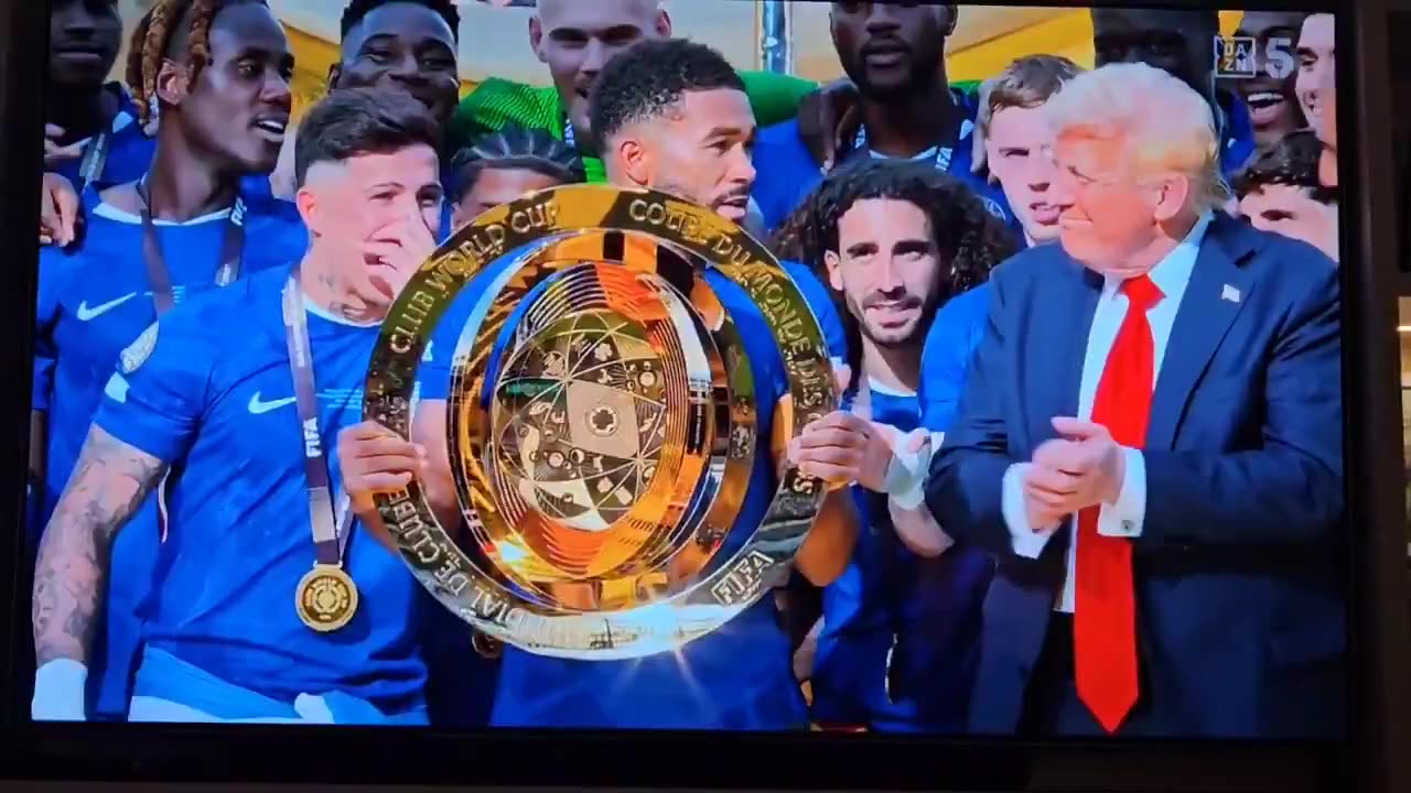 He hands the trophy. Captain says, may be you should leave. He doesn’t.