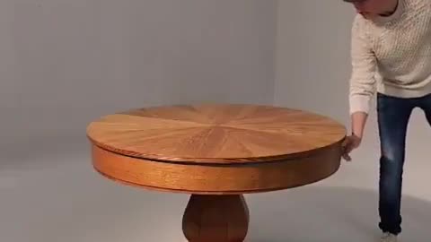 An Incredibly Designed & Crafted 1920's Expandable Circular Table