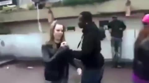 White French girl refuses African migrants advances.... gets slapped by 2 africans