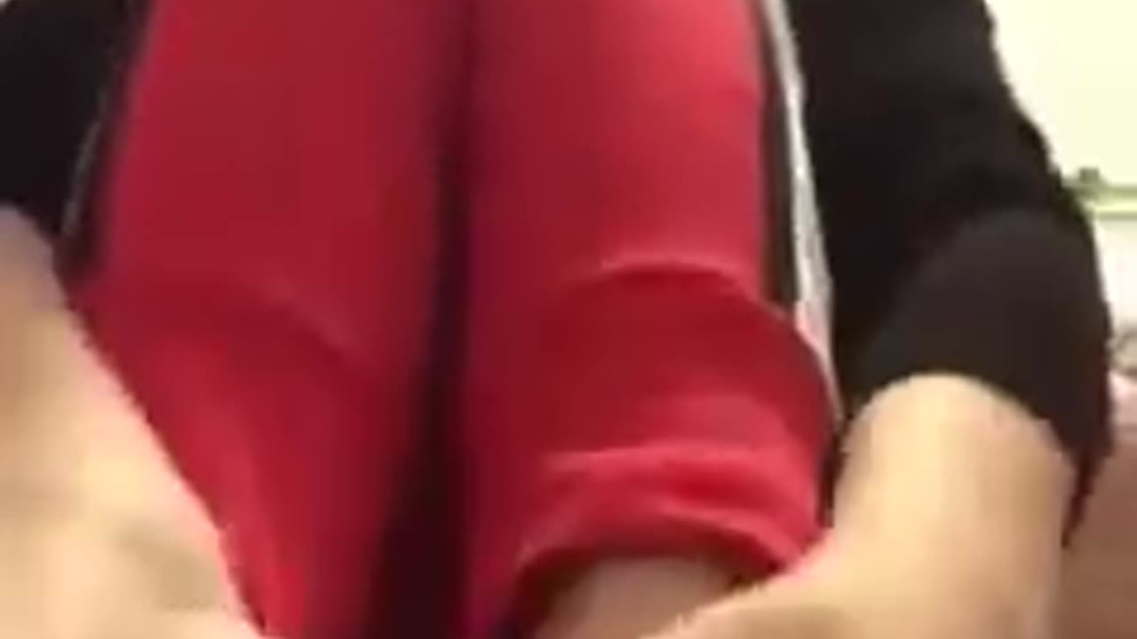 Lotioning her feet