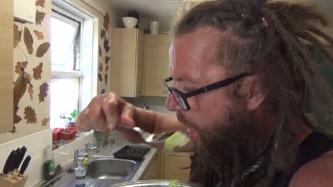 Cooking bloke. Spicy chicken wings and a huge salad.