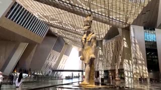The majestic statue of Pharaoh Ramses II greets guests at Egypt's Grand Egyptian Museum.