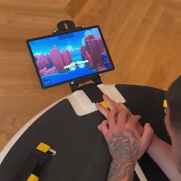 Ilia Topuria Testing His Core on a Gamified Plank Machine