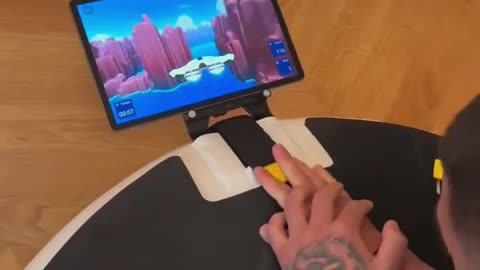 Ilia Topuria Testing His Core on a Gamified Plank Machine