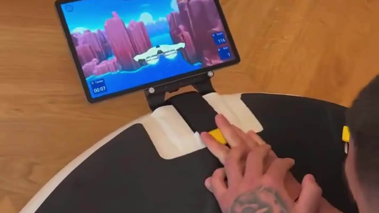 Ilia Topuria Testing His Core on a Gamified Plank Machine