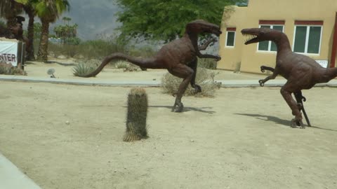 Raptors made from scrap metal