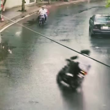 The motorcycle driver who is making a turn