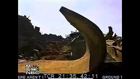 Bob Kelman, manager of a steel recycler, inspecting steel from the Twin Towers after 9/11