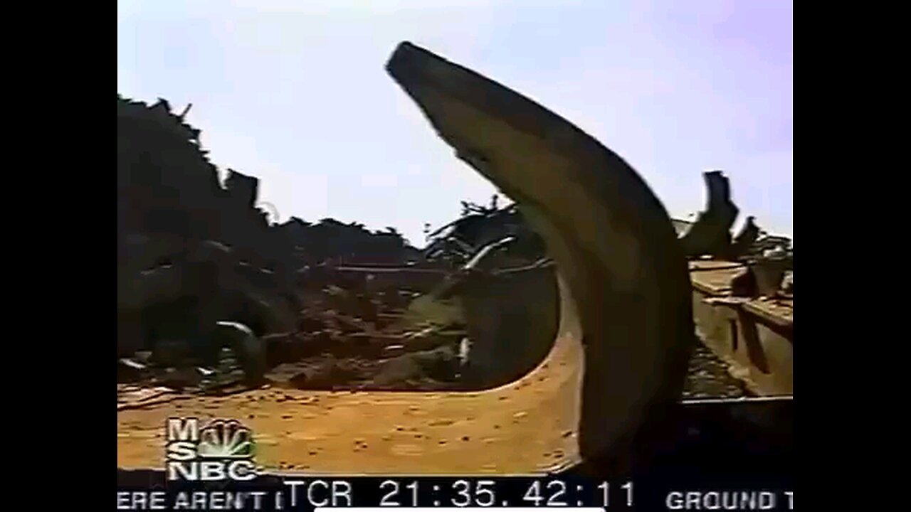 Bob Kelman, manager of a steel recycler, inspecting steel from the Twin Towers after 9/11
