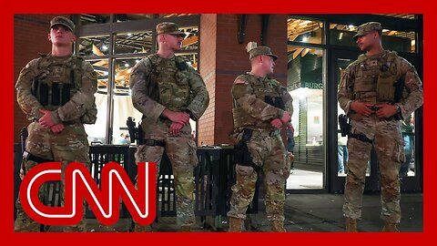 National Guard begins carrying firearms in DC