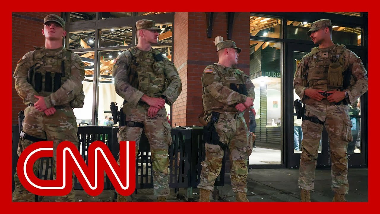 National Guard begins carrying firearms in DC