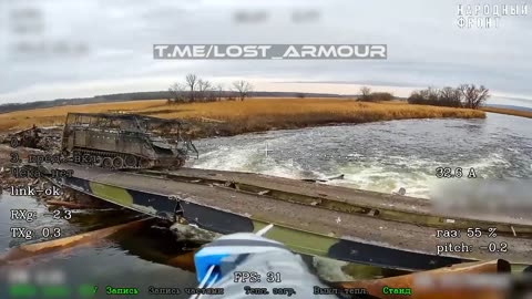 An American armored personnel carrier (APC) at the bottom of the Oskol River.