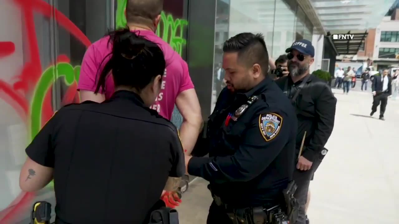 Climate vandals spray paint NYC Tesla dealership in Earth Day protest
