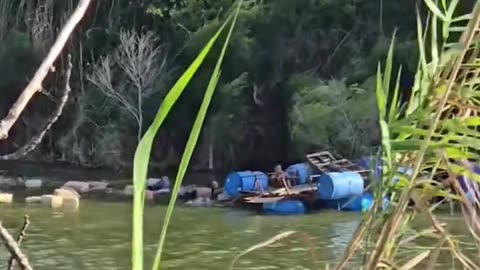 SMUGGLERS TRIED TO OUTSMART U.S. BORDER CONTROL BY FLOATING A PICKUP TRUCK LOADED WITH SUSPICIOUS BUNDLES ON A HOMEMADE RAFT