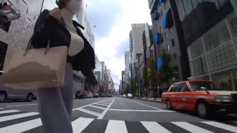 Woman crossing the street