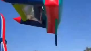 In South Africa, a bouncy castle was lifted into the air — and children fell out