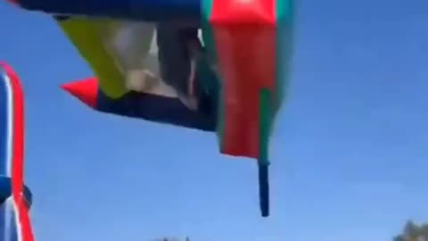 In South Africa, a bouncy castle was lifted into the air — and children fell out