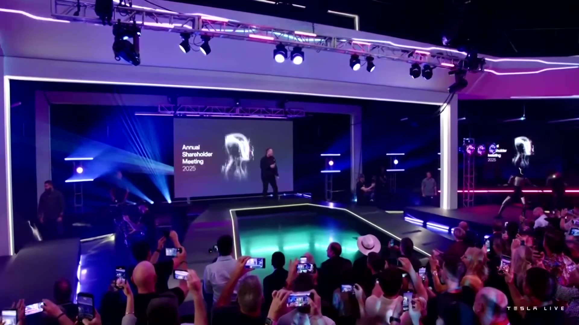 Musk shows off his dance moves at Tesla shareholders meeting