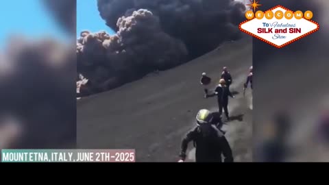 Hikers run as Mt. Etna Erupts