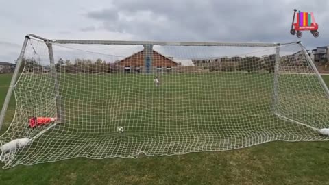 Munchie Giraffe Playing Soccer