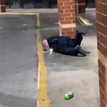 Policeman down and no one helps him. Sick society.