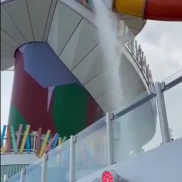 ‘STOP THE SLIDE!’ Passengers panic as a slide panel shatters on the world’s....