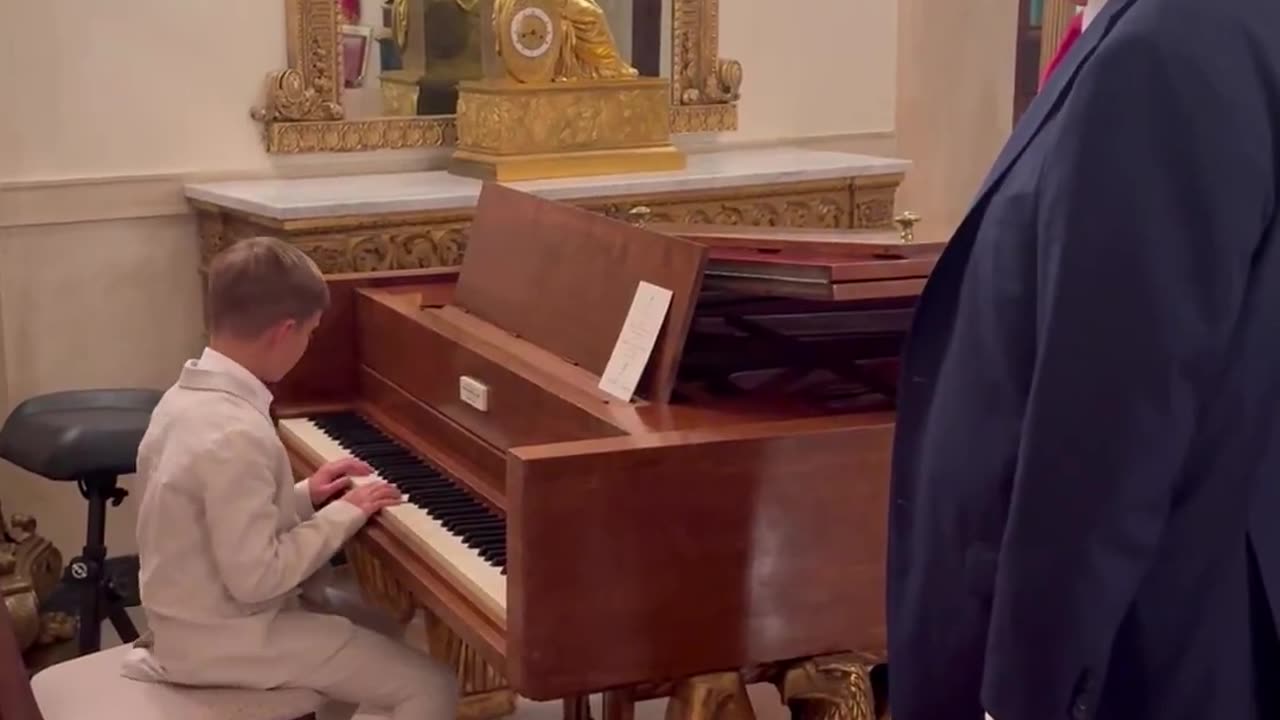 President Donald Trump's grandson Theo plays the piano at the White House.