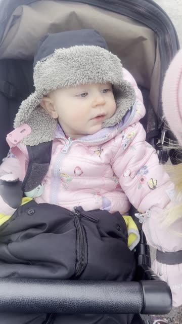 out for a winter walk with big sister and mommy