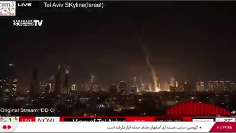 The moment of impact of first wave of Iranian missiles on targets in Tel Aviv