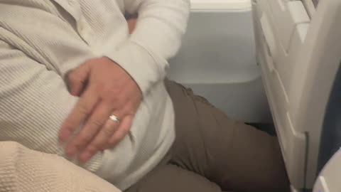 Tight Fit on WestJet Plane