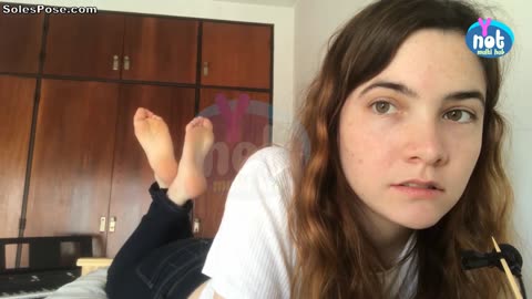 Gorgeous Brunette Soles Pose for Relaxation