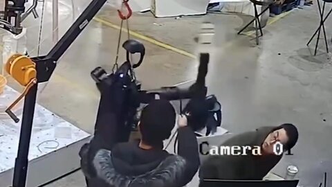 Humanoid robot from China almost hits a person 🤖😲