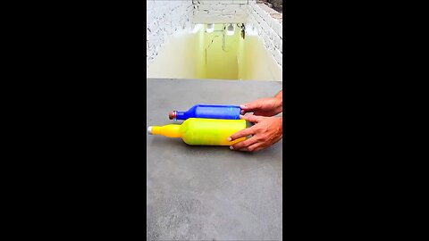 Incredible different colours of bottles falling from stairs to check hardness