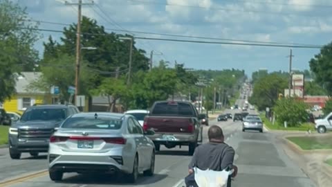 Wheelchair User Slows Traffic