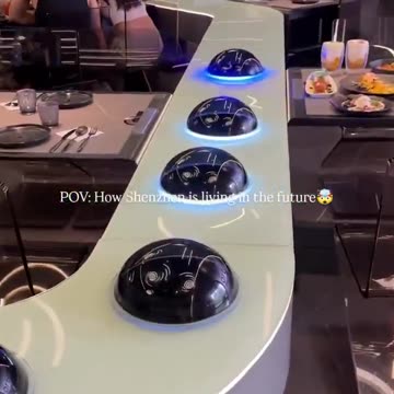 Robot UFOs are serving dinner at Orbit One restaurant