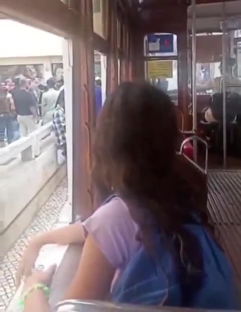 She looks around Lisbon and sees no Portuguese, women and children. She