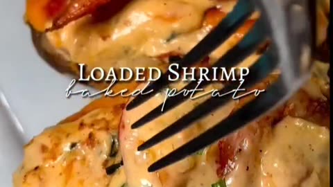 Baked potato with topping creamy and cheesy shrimp, delicious snacks