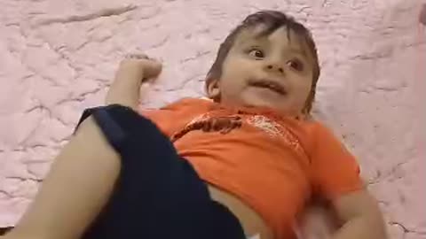 Radmehr, a cute little boy trying to do a backflip
