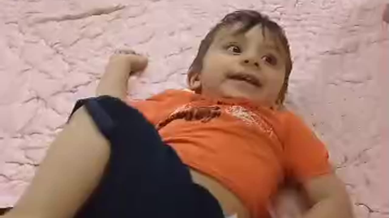 Radmehr, a cute little boy trying to do a backflip