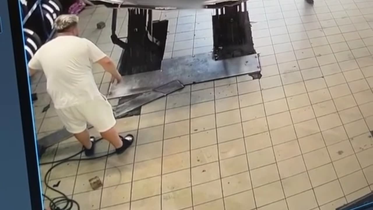 Car Tilts as Lift Fails