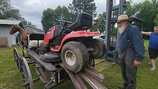MENNONITE HORSE AND WAGON HAUL AWAY OUR RIDING LAWN MOWER!