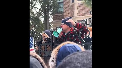 Walz Yells Over Metal gate Like a Mental Patient w/a Little Bullhorn - He is inciting violence.