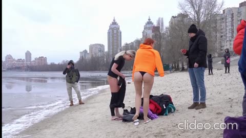 beautiful women go into cold water